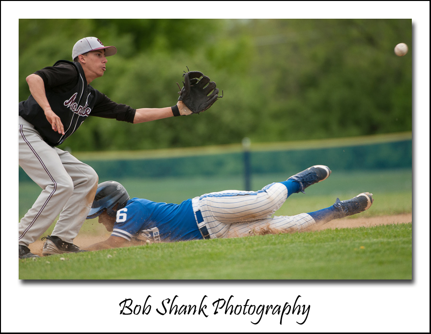 Ariel Mejia slides into second base on a successful steal attempt.